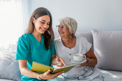 patient and caregiver smiling and spending time together